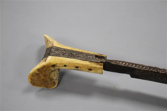 A Turkish sword Yataghan, with silver inlaid decoration and inscription, ivory grips, overall length 72cm